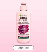 Le texte se lit comme suit : « Image 5 » et « J'ACHÈTE ». Bouteille Garnier Ultra Doux rose sur fond rose, avec des images roses sur l'emballage du produit.