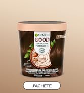 Pot de produit avec le bouton « JACHETE » visible en dessous. Récipient cosmétique ou alimentaire de couleur foncée sur fond beige.