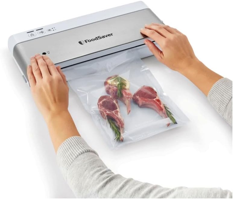 FoodSaver - machine sous vide compacte, inox/blanc, rouleau et sacs inclus, VS0100X